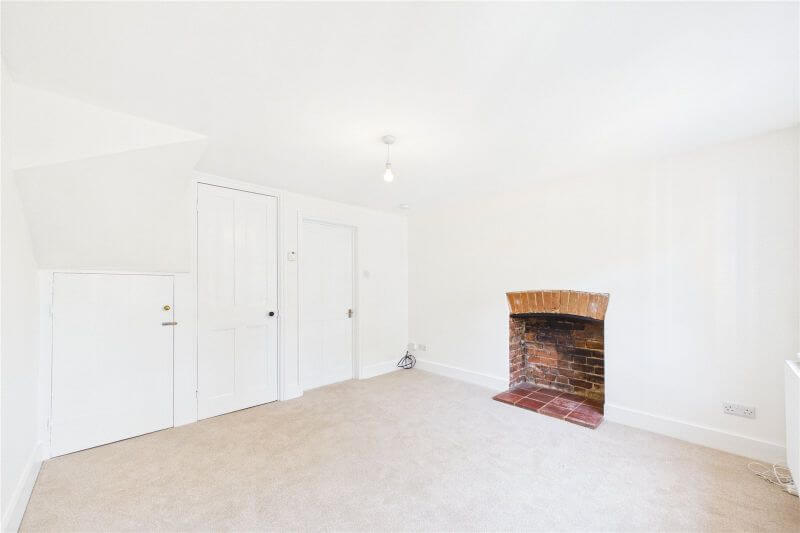 Bath Road cottage - lounge and fireplace