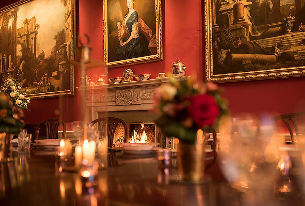 The Dining Room at Englefield Estate with fireplace blazing