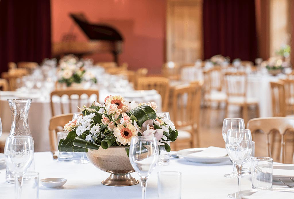 Wedding breakfast tables in The Long Gallery at Englefield Estate