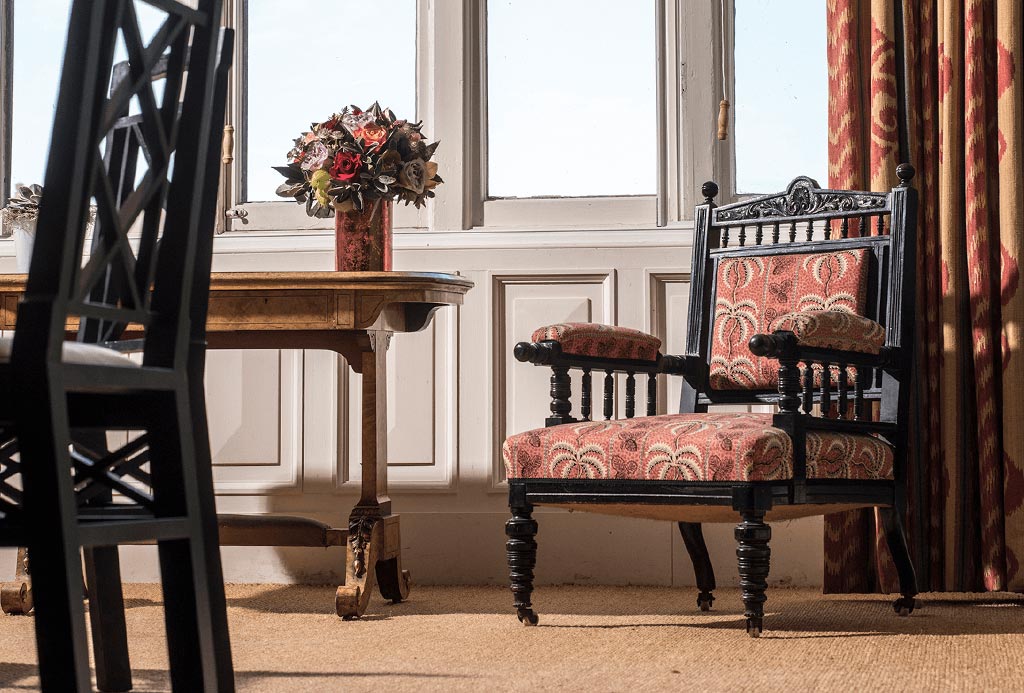 Chair by window in Governors Room at Englefield Estate